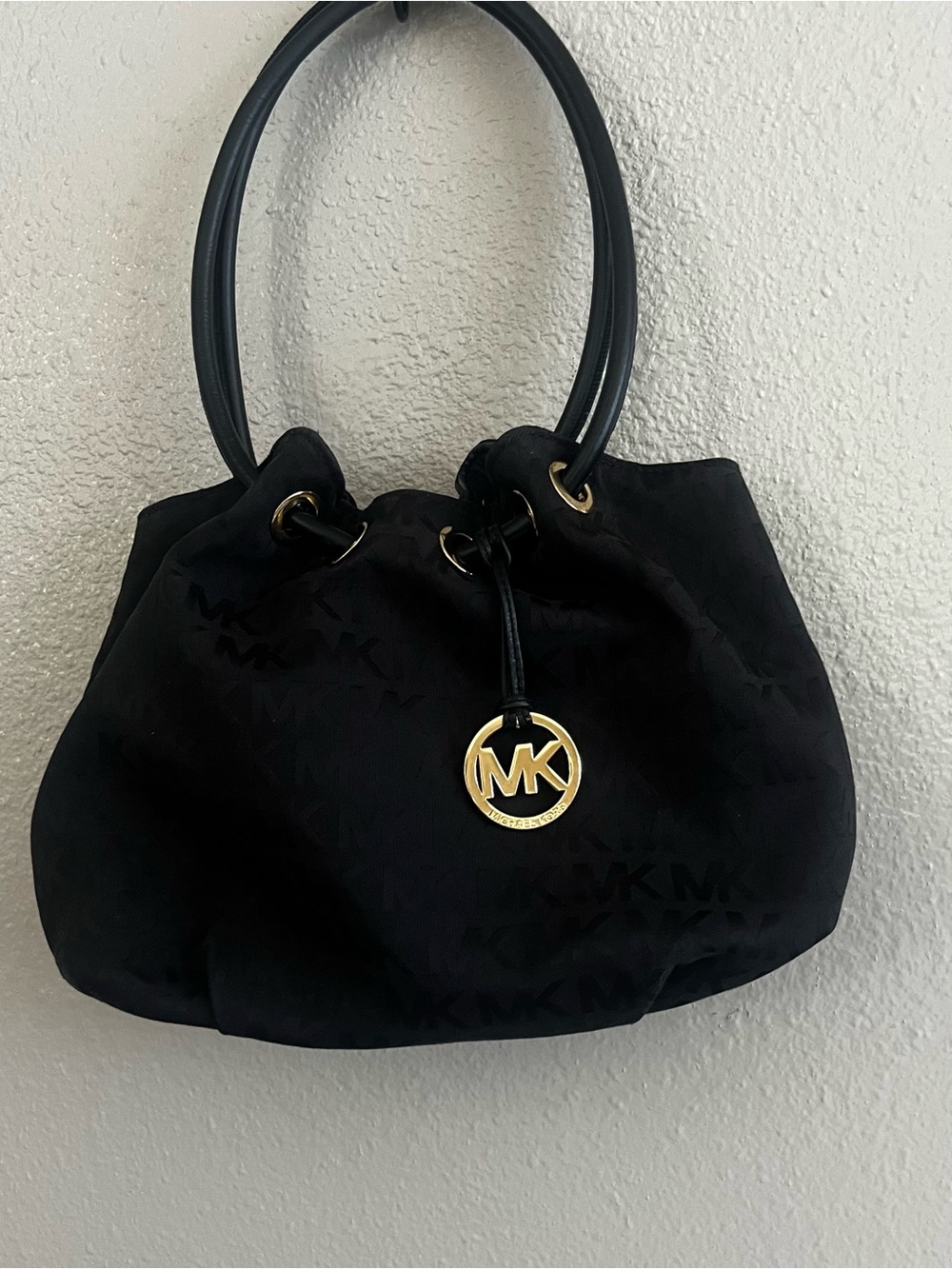 Michael Kors Black MK Monogram Drawstring Tote with Gold Charm - Picture 6 of 9